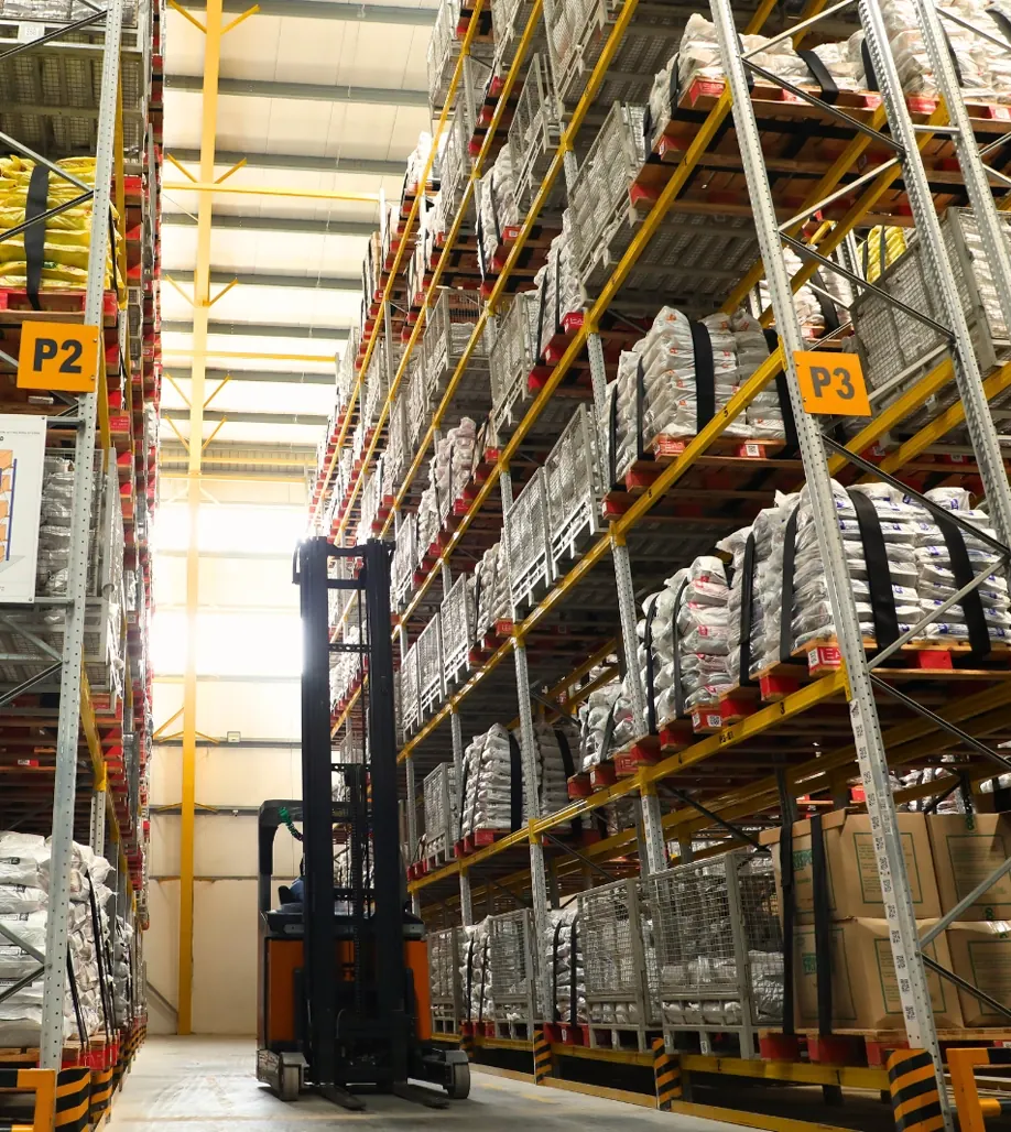 A forklift working inside Godrej pallet racking